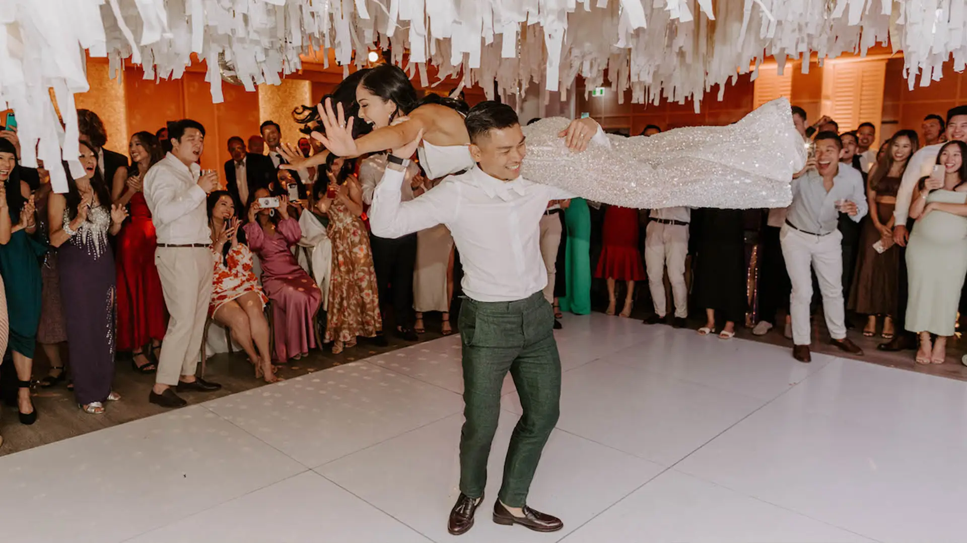 Lucy Suze Celebrant Wedding Dance with Groom Swinging Bride across Shoulders